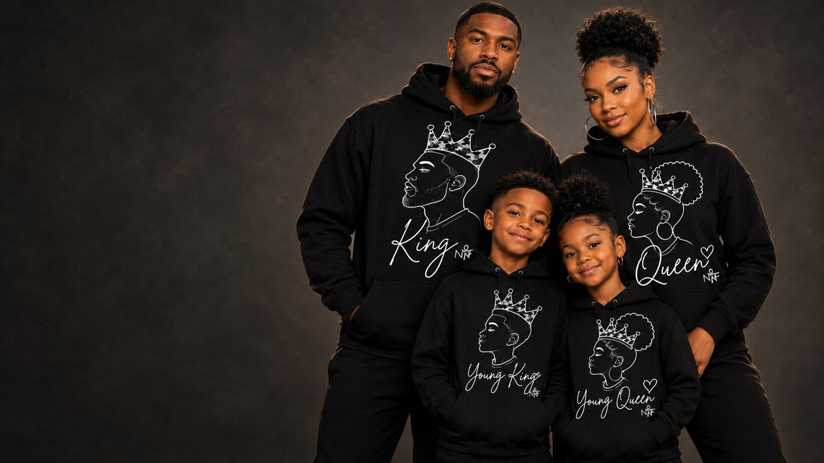 A Black family of four in matching King, Queen, Young King and Young Queen hoodies